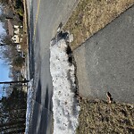 Unshoveled Sidewalk at Heritage Rd