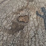 Pothole at 28–34 Governor Hutchinson Rd