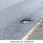 Pothole at 124 Lexington Rd