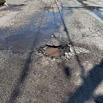 Pothole at 10 Governor Hutchinson Rd