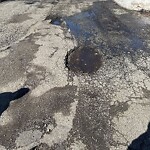 Pothole at 16 Governor Hutchinson Rd